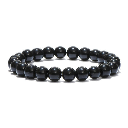 Black obsidian beaded bracelet over white background