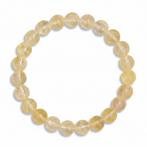 Yellow citrine beaded bracelet on a white background