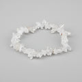 Crystal chip bracelet on a gray background