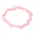Rose quartz stone bracelet on a white background